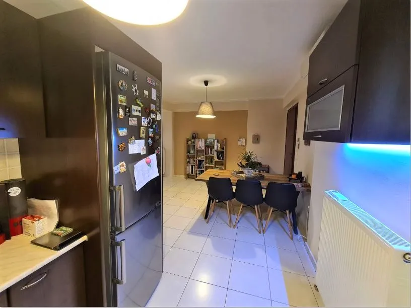 modern kitchen and kitchen table of the apartment in Patras