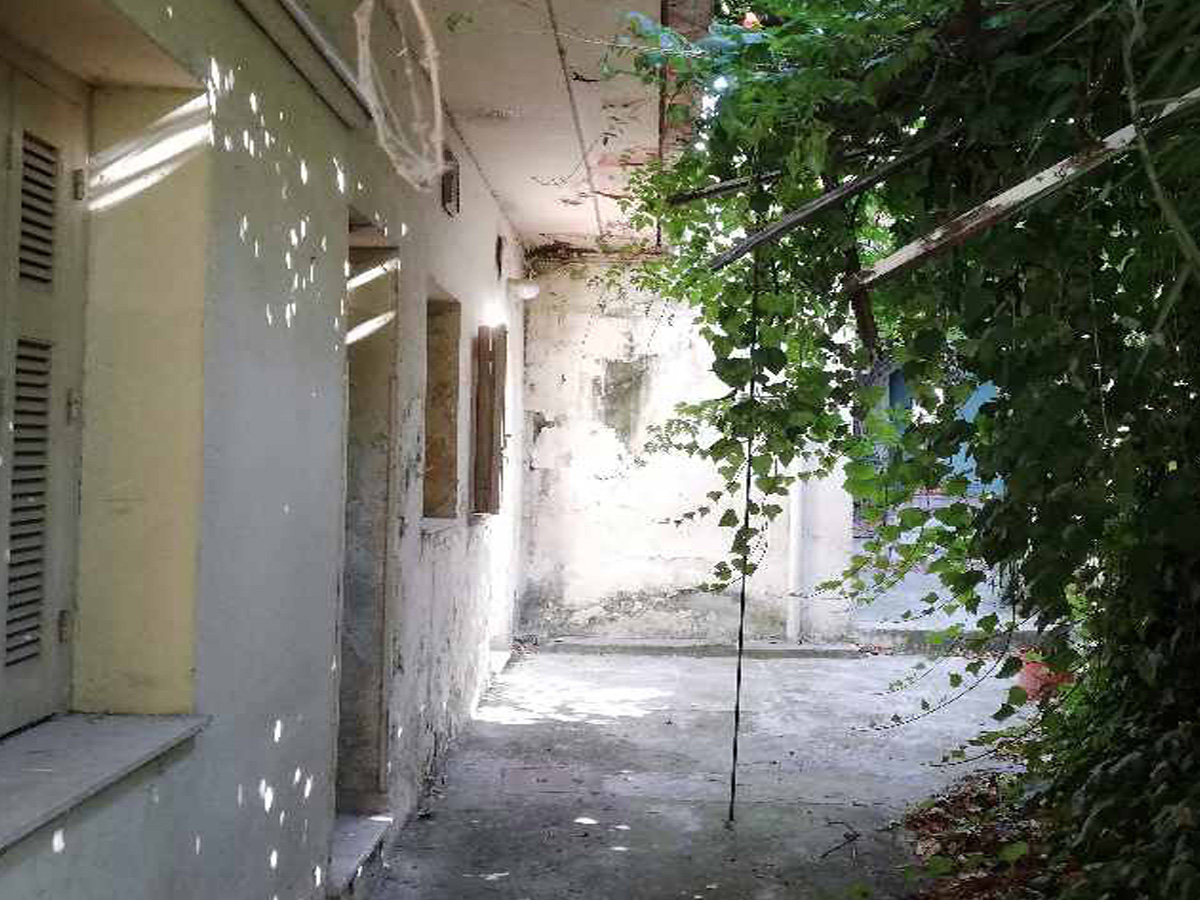 Plot with old house near Exarchia square Athens is for sale