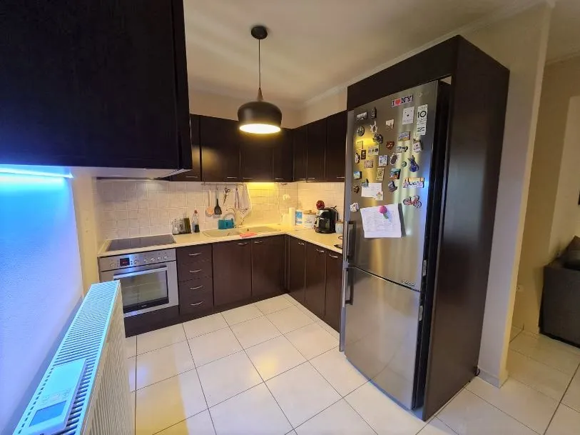 Fully furnished apartment kitchen in Patras